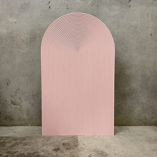 image of a pink ripple arch wall