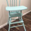 image of a blue baby high chair