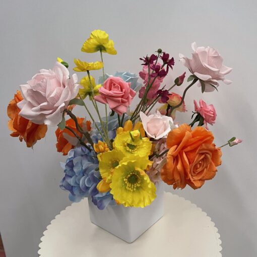 Bright blooms faux flowers table arrangement