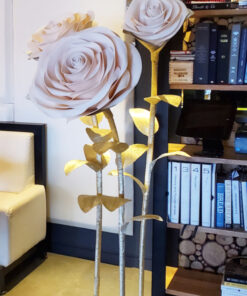 image of giant standing roses on a gold metal base