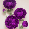 Royal Purple Giant Peony featuring oversized deep purple and violet peonies with beautifully layered petals, matching flower buds, tall green stems, and realistic foliage. Elegant giant flower rental for weddings, birthdays, bridal showers, baby showers, and corporate events by Magic Flowers Event Rentals in Toronto and GTA.