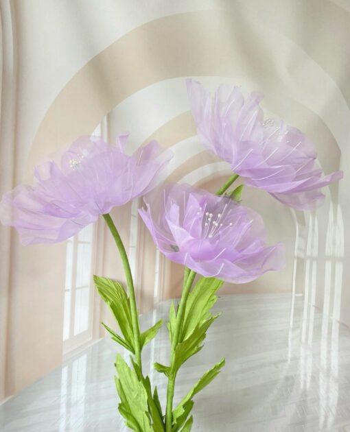 3 Purple Silk Flowers.