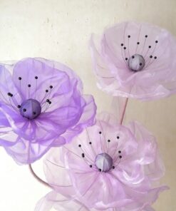 3 Lilac Blooms on a Metal Stand
