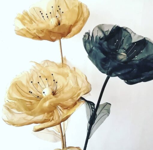3 Flowers on a Metal Stand