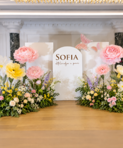 Floral Dreams Package featuring oversized pastel pink and white giant flowers, lush greenery, garden-style floral bushes, and elegant white backdrop panels for weddings, showers, birthdays, and luxury event decor.