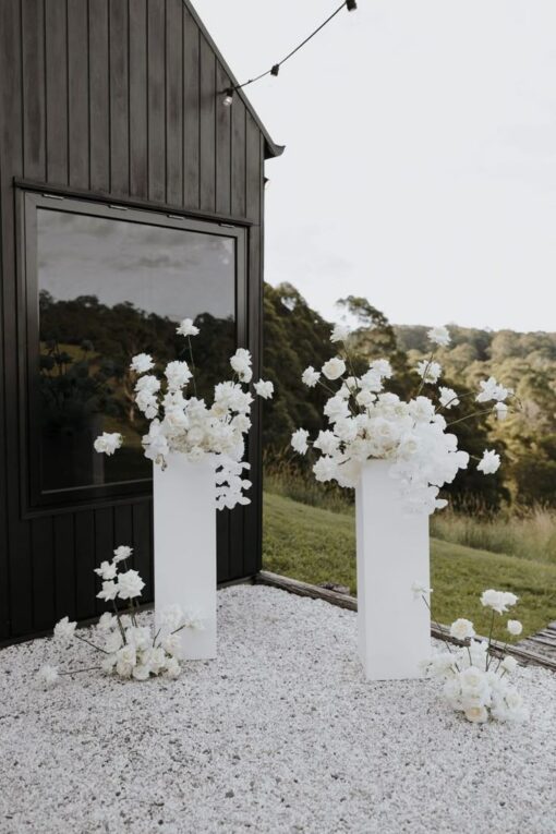 Elegant White Floral Pedestal Display