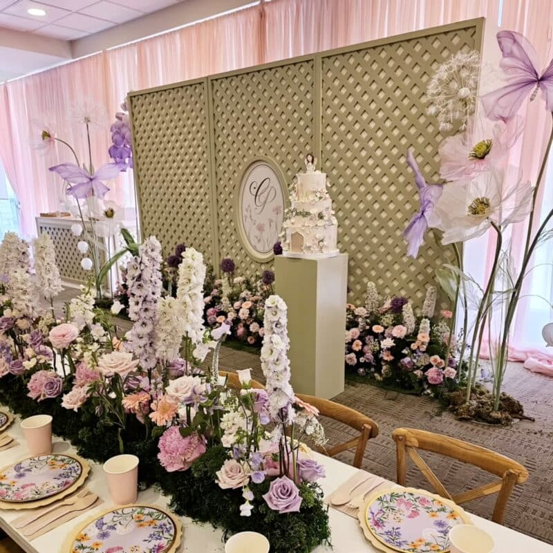 Whimsical kids party setup with pastel flowers, themed table decor, and fairy-tale props by Magic Flowers Event Rentals in the GTA.