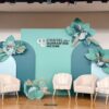 Modern Teal Arch Stage Backdrop, a contemporary and elegant setup designed for conferences, panel discussions, brand launches, corporate galas, and networking events across Toronto and the GTA.