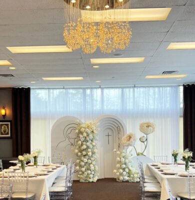 Baptism party rentals featuring backdrops and flower arrangement rentals in Aurora.