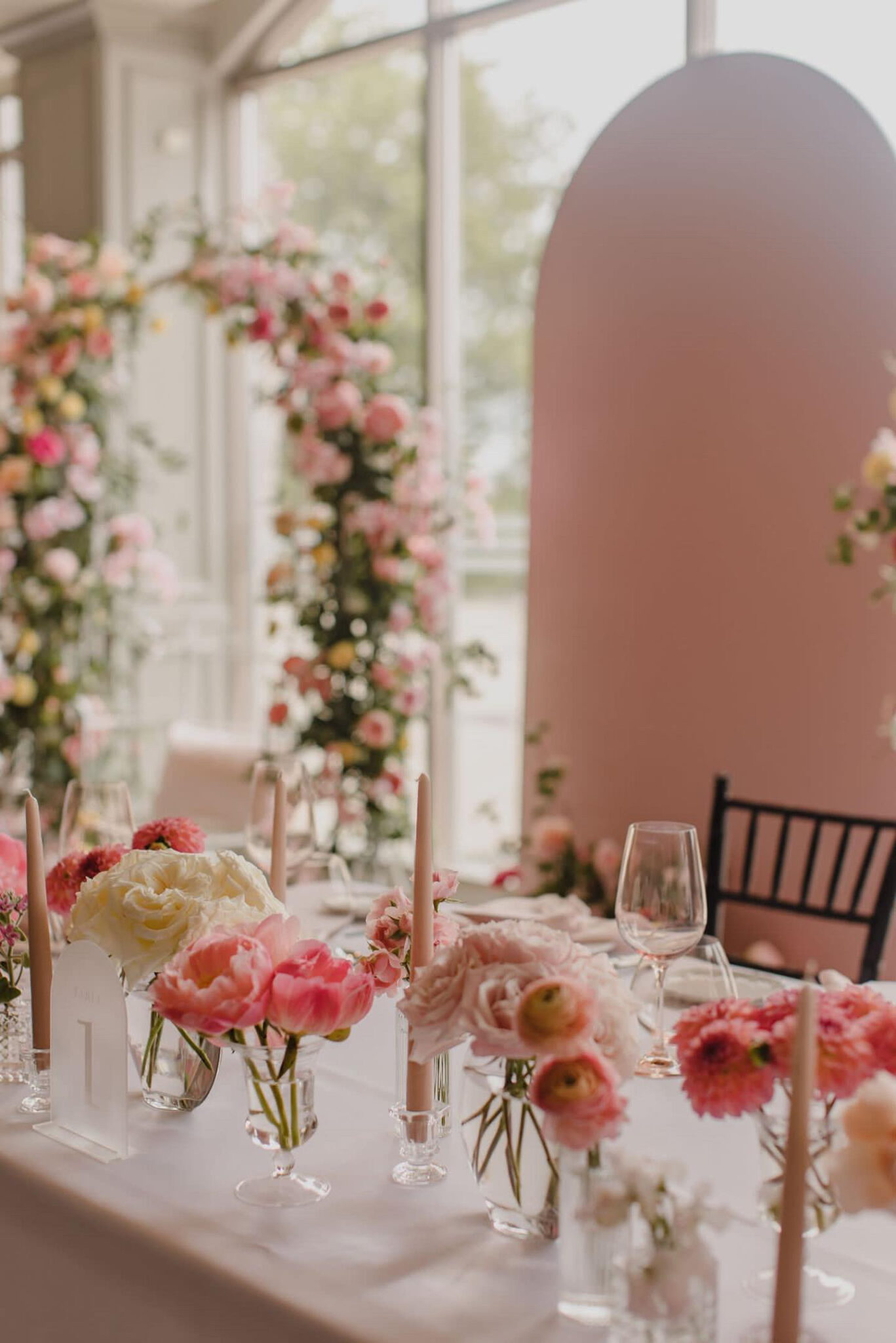 Elegant backdrop, floral arch and table floral centerpiece rentals for a wedding party in Scarborough.