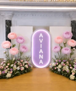 Enchanted Bloom Package with personalized name, giant pastel flowers, and lush pink, purple, and white floral arrangements.