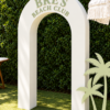 Modern white 3D open arch backdrop with custom lettering, ideal for weddings, bridal showers, birthdays, corporate events, and photo displays.