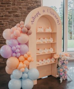 Arched Treat Wall Backdrop with built-in shelves for party favours, desserts, gifts, and event displays.