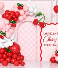 Cherry first birthday backdrop with pink, red and white balloons, custom cherry decorations, pink checkered arch, and personalized wavy birthday sign.
