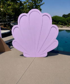 Lavender seashell-shaped event backdrop with raised shell detailing, ideal for mermaid parties, under-the-sea themes, birthdays, baby showers, and photo areas.